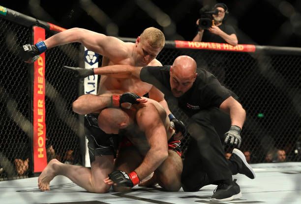Sergei Pavlovich defeating Shamil Abdurakhimov at the O2 Arena. Credits to: Justin Setterfield-Zuffa LLC.
