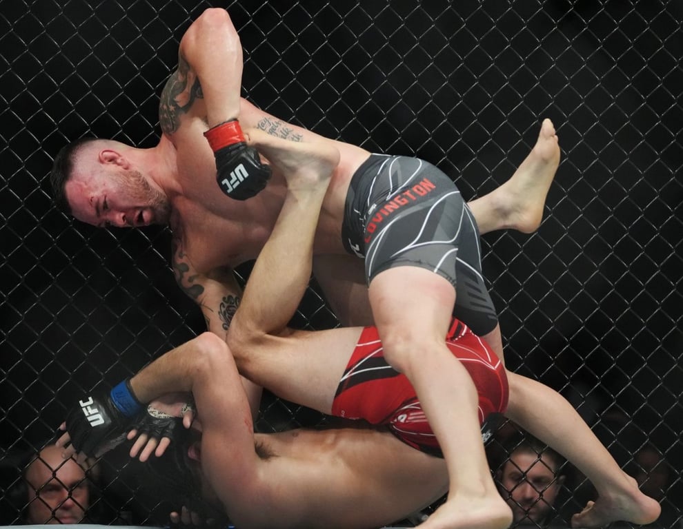 Colby Covington lands heavy shots on Jorge Masvidal. Credits to: Stephen R. Sylvanie USA-TODAY Sports