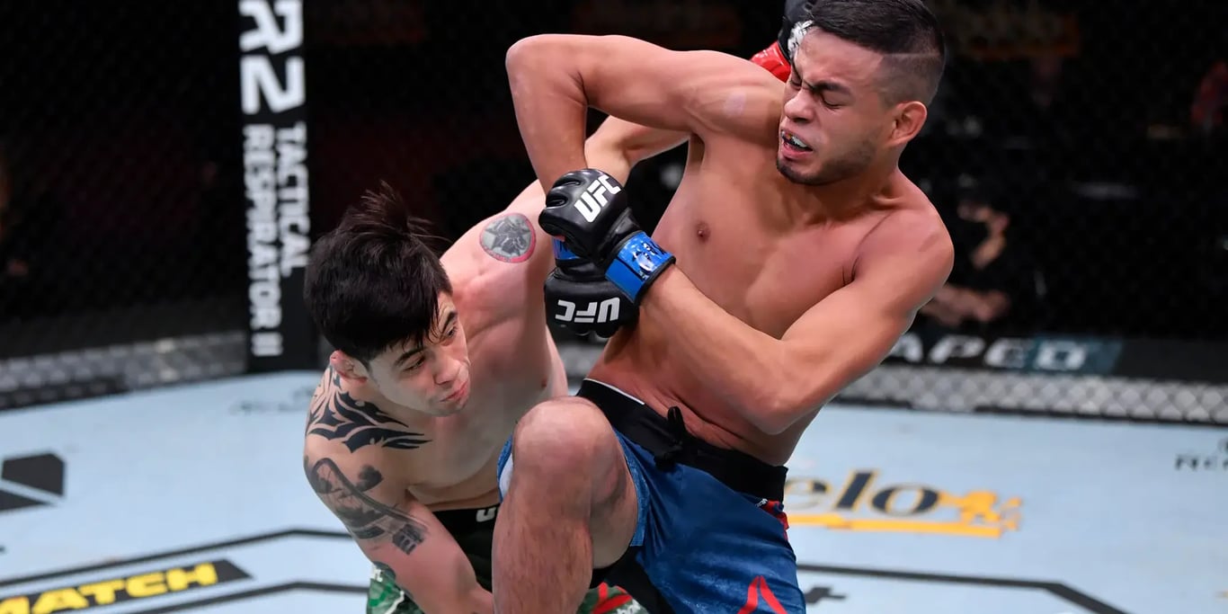 Brandon Moreno and Brandon Royval facing eachother for the first time at UFC 255. Credits to: Chris Unger - Zuffa LLC.