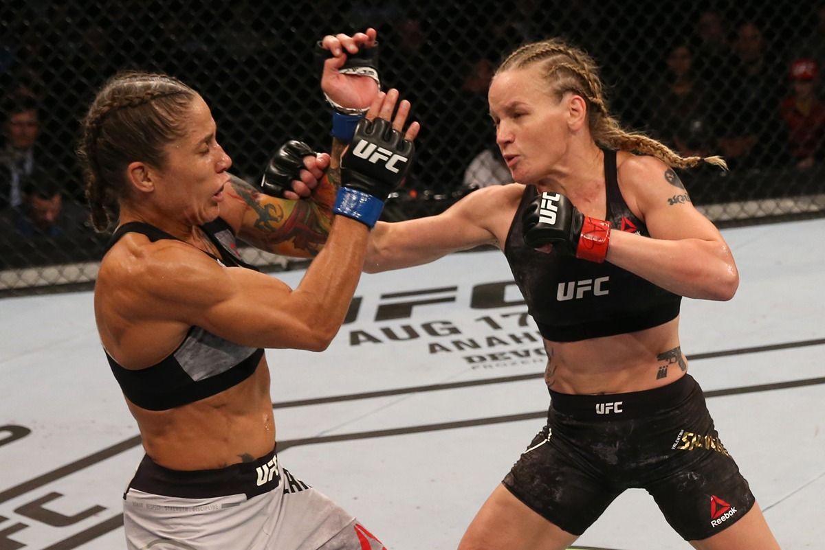 Valentina Shevchenko unloads a combination on Liz Carmouche. Credit: Bleacher Report.