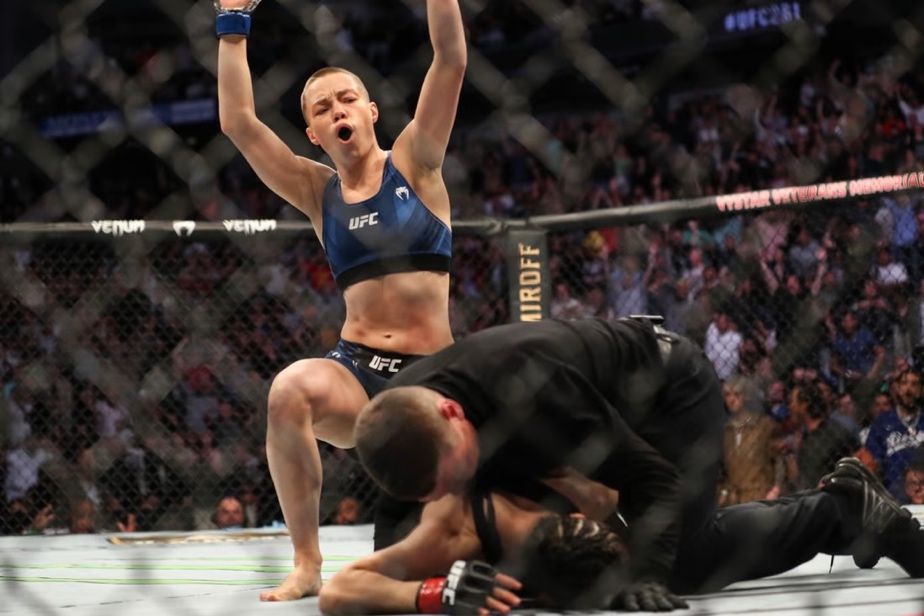 Rose Namajunas raises her hands after finishing Joanna Jedrzejczyk. Credits to: AFP