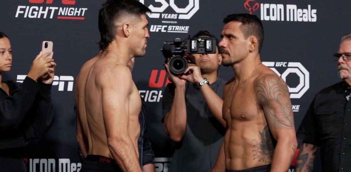 Vicente Luque and Rafael dos Anjos face off. Photo by MMAJunkie.