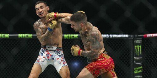 Ilia Topuria lands a right hand against Max Holloway at UFC 308. Credit: AP Photo/ Altaf Qadri