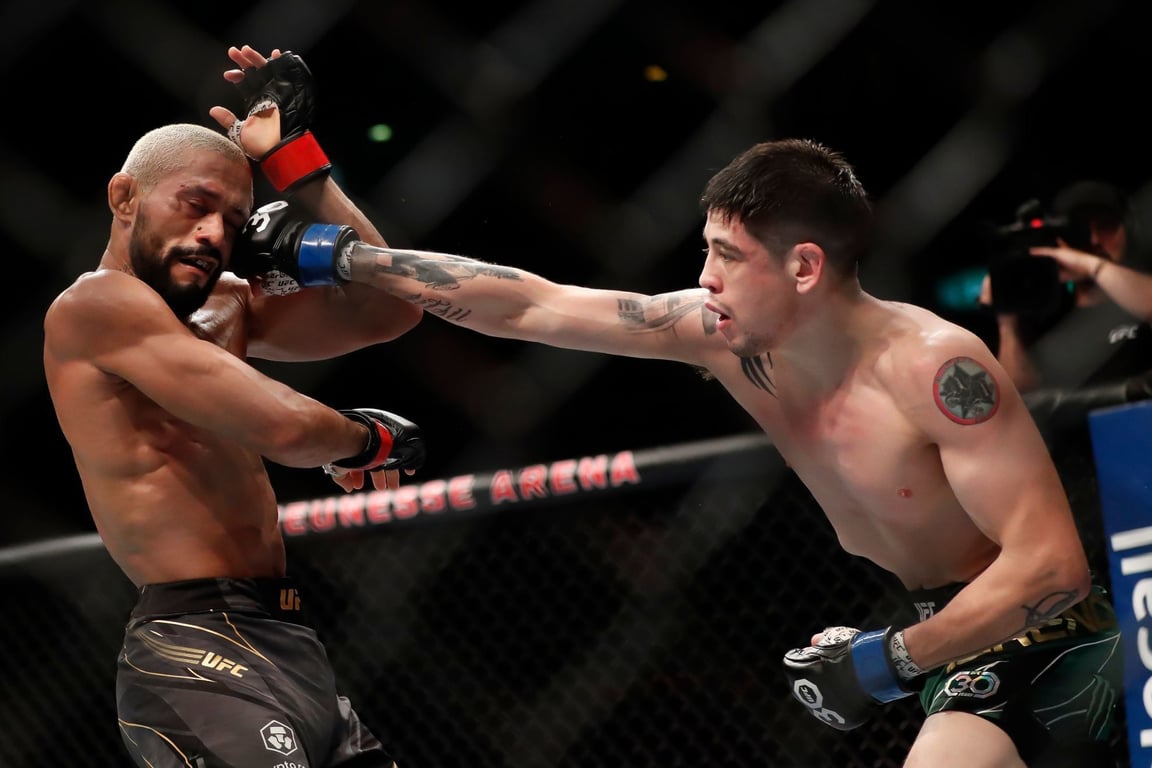 Brandon Moreno lands the finishing blow on his longtime rival. Credits to: Zuffa LLC.