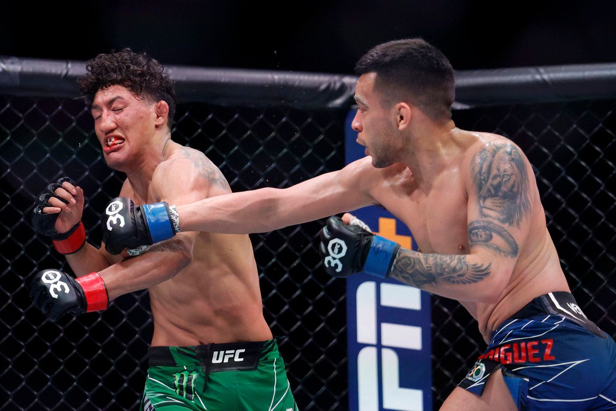 Christian Rodriguez lands a right hand on Raul Rosas Jr. Credit: Zuffa LLC.