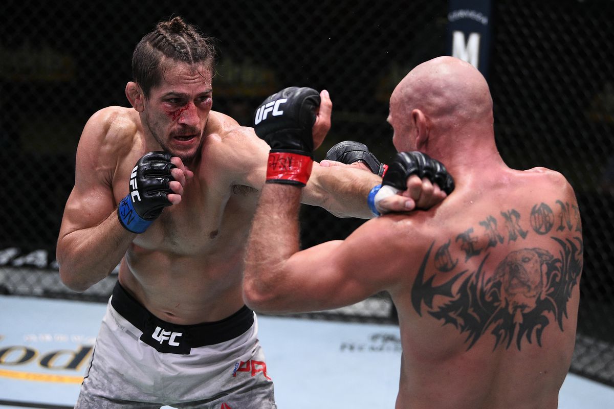 Niko Price pumps out his jab at Donald Cerrone. Credit: MMA Mania.