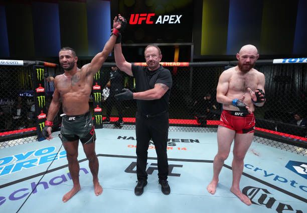 Mike Davis gets his hand raised and earns the victory at UFC Vegas 61. Credits to: Jeff Bottari-Getty Images.