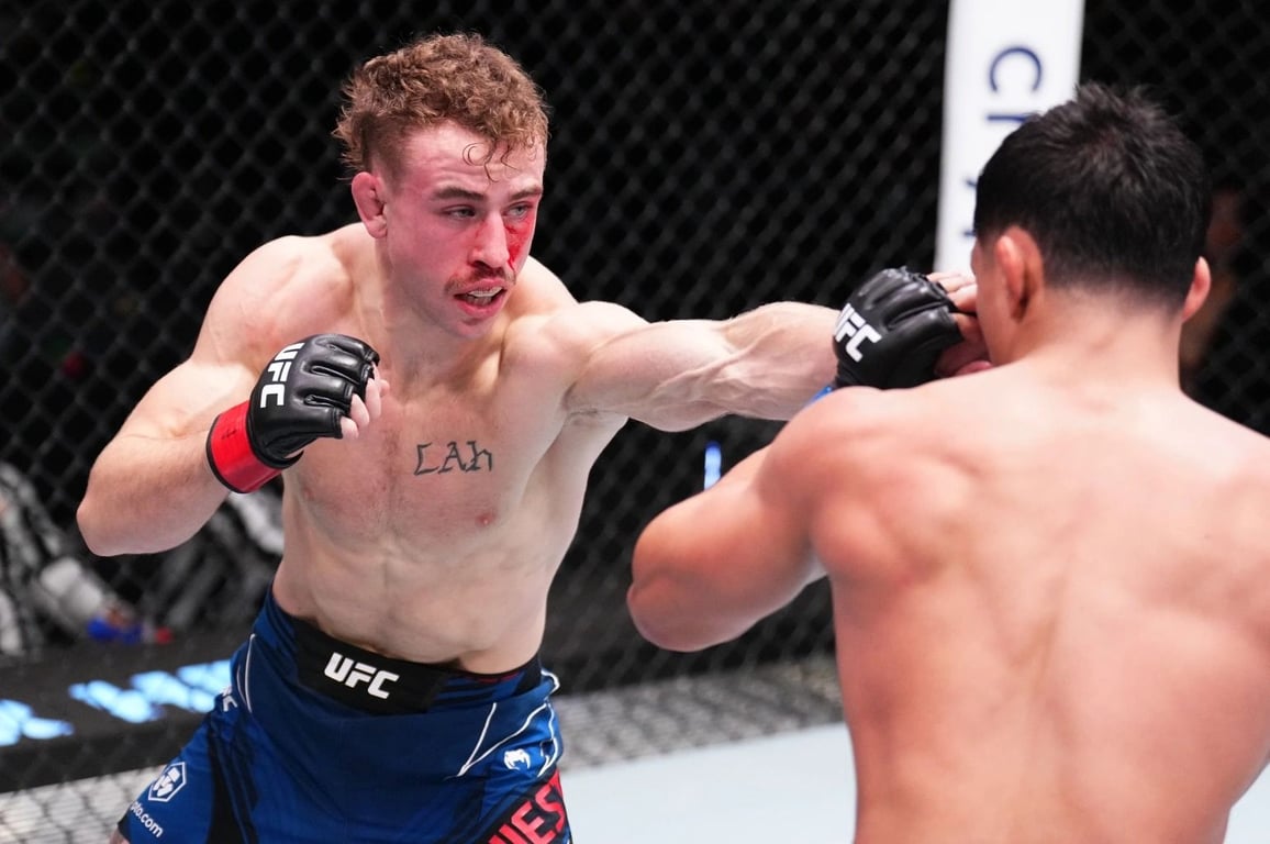 Brady Hiestand punches Fernie Garcia during the UFC Fight Night event at UFC APEX on November 19, 2022, in Las Vegas, Nevada. Credit: Chris Unger/Zuffa LLC.