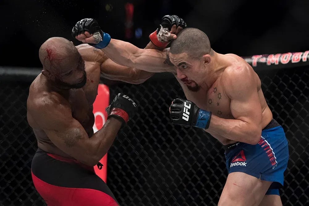 Yoel Romero and Robert Whittaker going to war at UFC 213. Credits to: Kyle Terada - USA TODAY Sports.