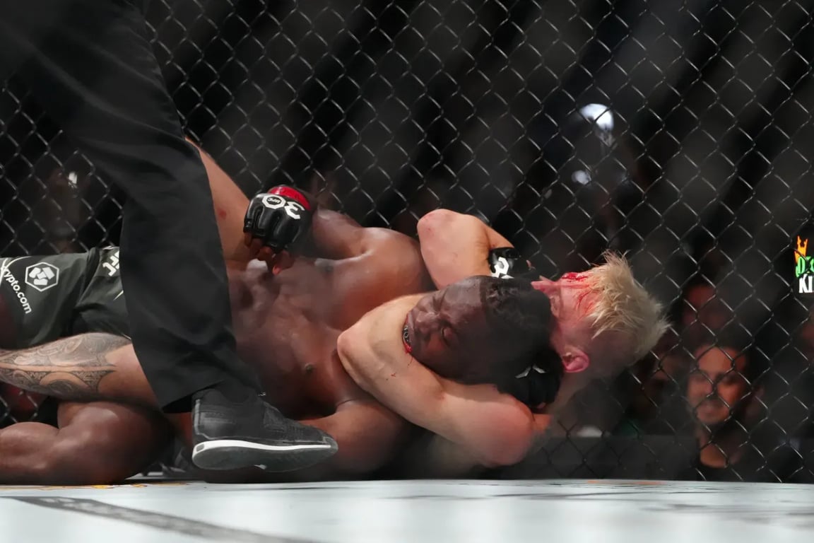 Dan Hooker choking Jalin Turner in the second round of their fight. Credits to: Stephen R. Sylvanie - USA TODAY Sports.