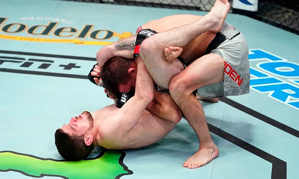 Jimmy Flick submits Cody Durden by flying triangle. Photo by MMAJunkie.