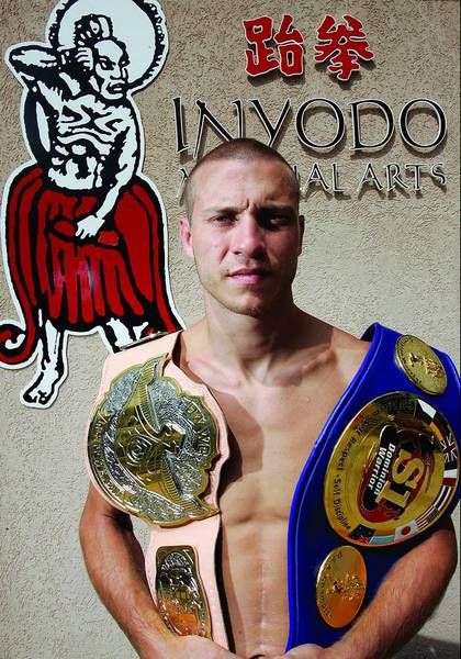 A young Cowboy Cerrone shows off his kickboxing titles. Credit: Zuffa LLC.