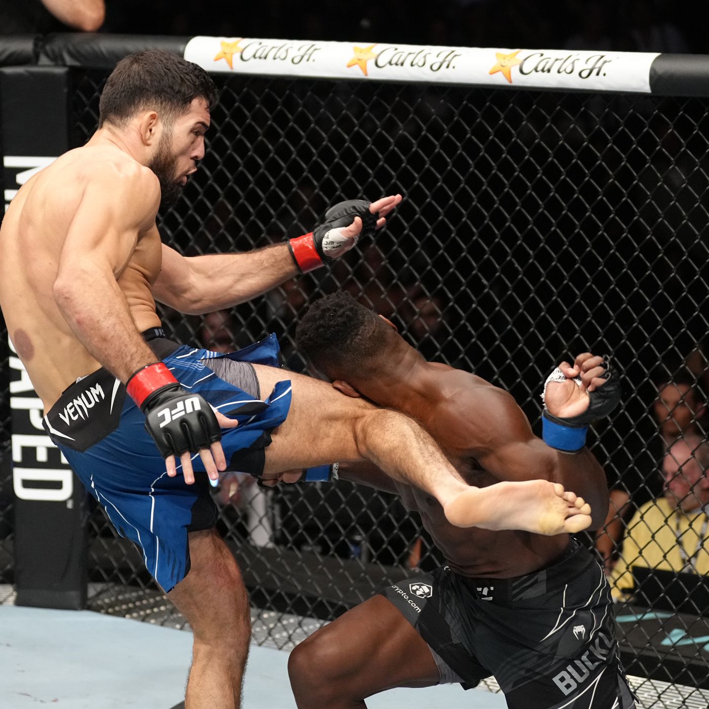 Nassourdine Imavov lands a knee on Joaquin Buckley at UFC Paris. Credits to: Jeff Botari - Zuffa LLC