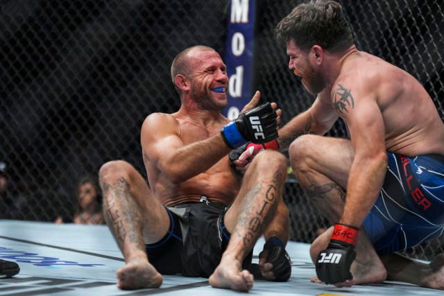 Donald Cerrone and Jim Miller embrace after their fight. Credits to: Chris Unger-Zuffa LLC