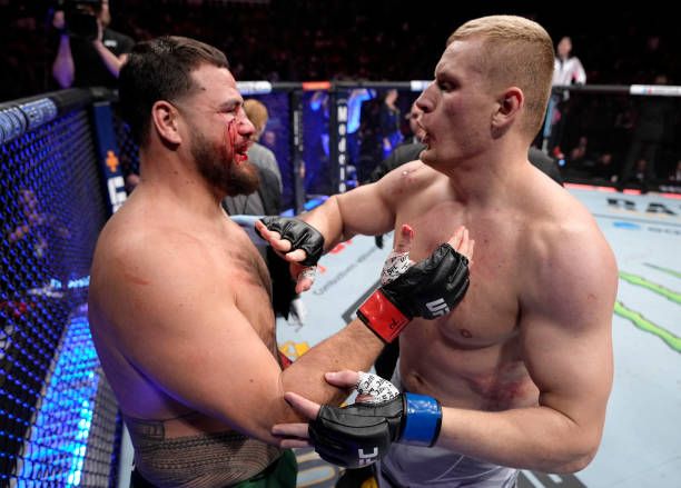 Sergei Pavlovich and Tai Tuivasa embracing after their fight at UFC Orlando. Credits to: Jeff Bottari-Zuffa LLC.