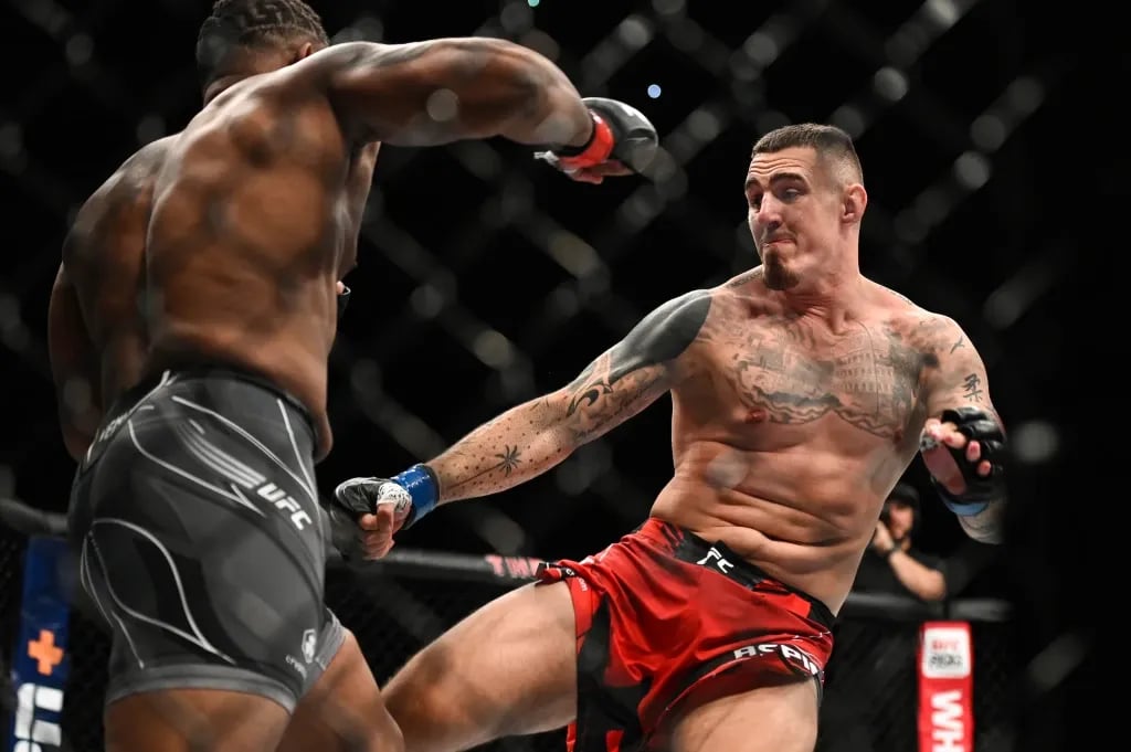 Tom Aspinall landing a leg kick on Curtis Blaydes moments before blowing his knee out. Credits to: Haljestam - USA TODAY Sports.