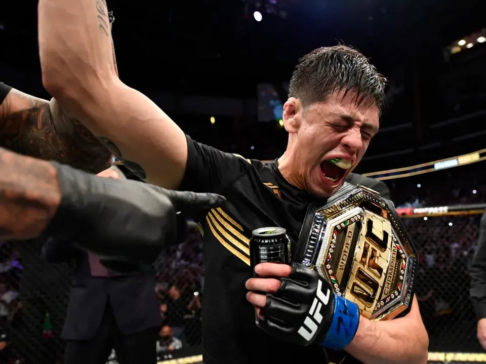 Brandon Moreno overwhelmed with emotion after becoming Flyweight Champion. Credits to: Jeff Bottari-Zuffa LLC