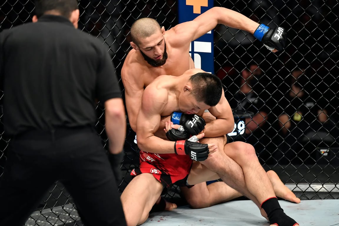 Khamzat Chimaev dominating Li Jingliang in his comeback fight - Chris Unger/Getty Images