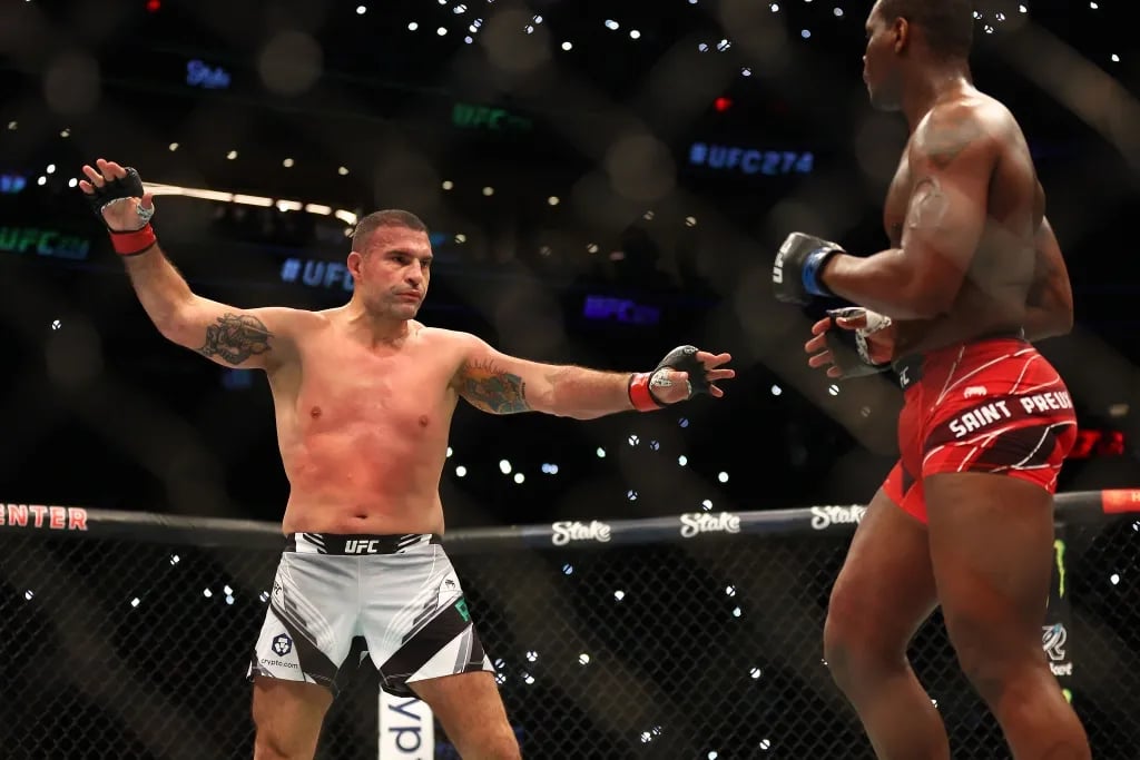 Fans in the arena turn on the flashlights on their phones during the fight. (Mark J. Rebilas-USA TODAY Sports)