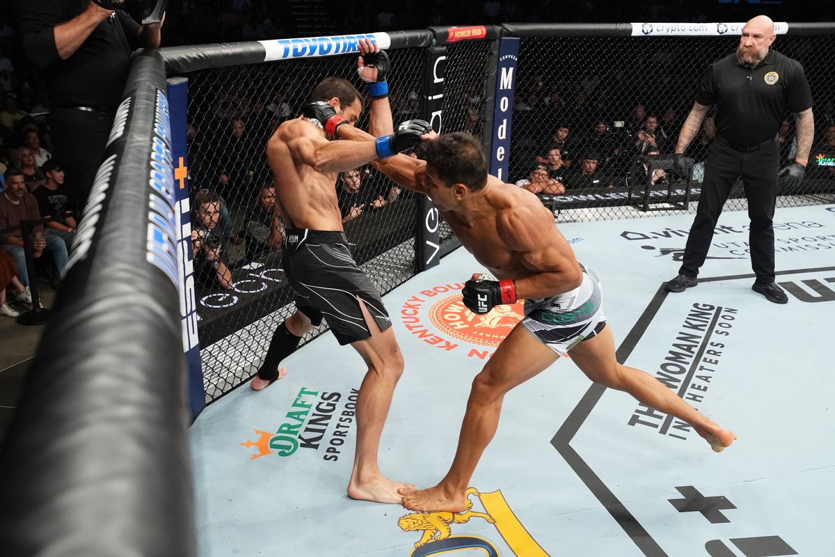 Luke Rockhold and Paulo Costa engage in a bloody war at UFC 278. Credit: MMA Fighting.