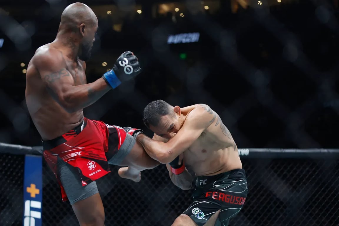 Bobby Green kicking Tony Ferguson at UFC 291. Credits to: Jeff Swinger - USA TODAY Sports.