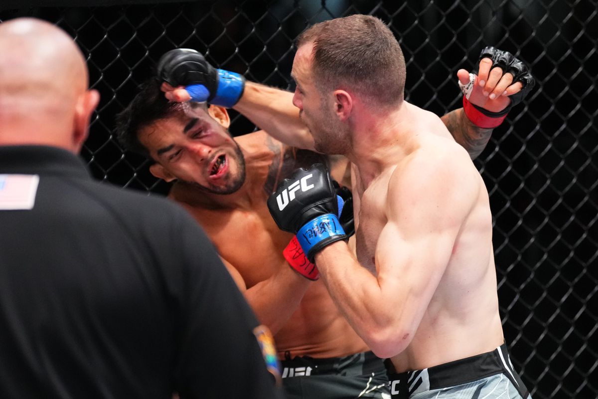 Uros Medic blasts Omar Morales with a right hand. Credit: MMA Fighting.