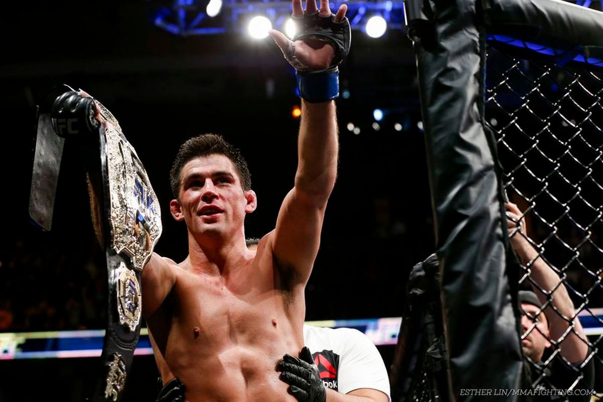 Dominick Cruz celebrates a title victory. Credit: Esther Linn, MMA Fighting.