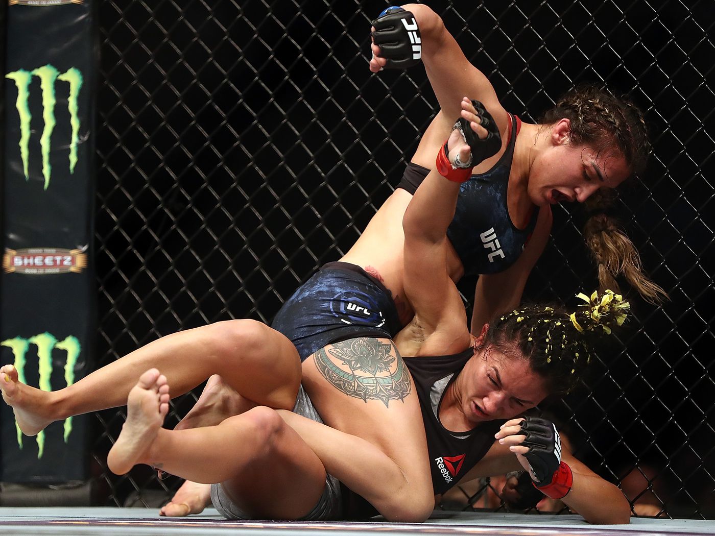 There's not a lot that you can do when Tatiana Suarez is mauling you. Photo by MMAFighting.