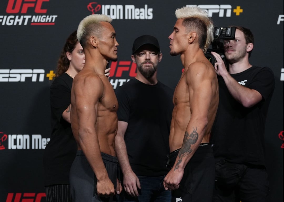 Shayilan Nuerdanbieke and TJ Brown face off before their Featherweight bout. Credits to: Jeff Bottari-Zuffa LLC