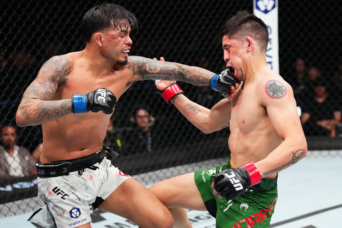Brandon Royval lands a stiff jab on Brandon Moreno. Credit: MMA Fighting.