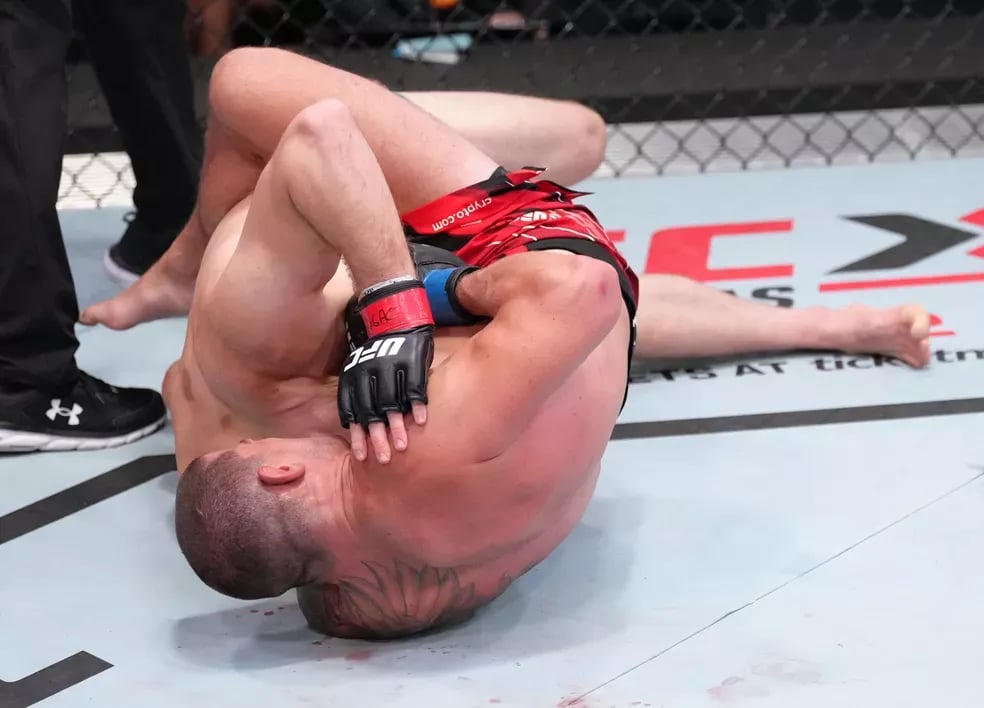 Marc-André Barriault securing the first submission win of his career. (Jeff Bottari/Getty Images)