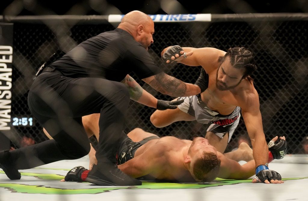 Josh Quinlan after knocking Jason Witt unconscious at UFC Fight Night: Vera vs. Cruz. Credits to: Joe Camporeale - USA TODAY Sports.