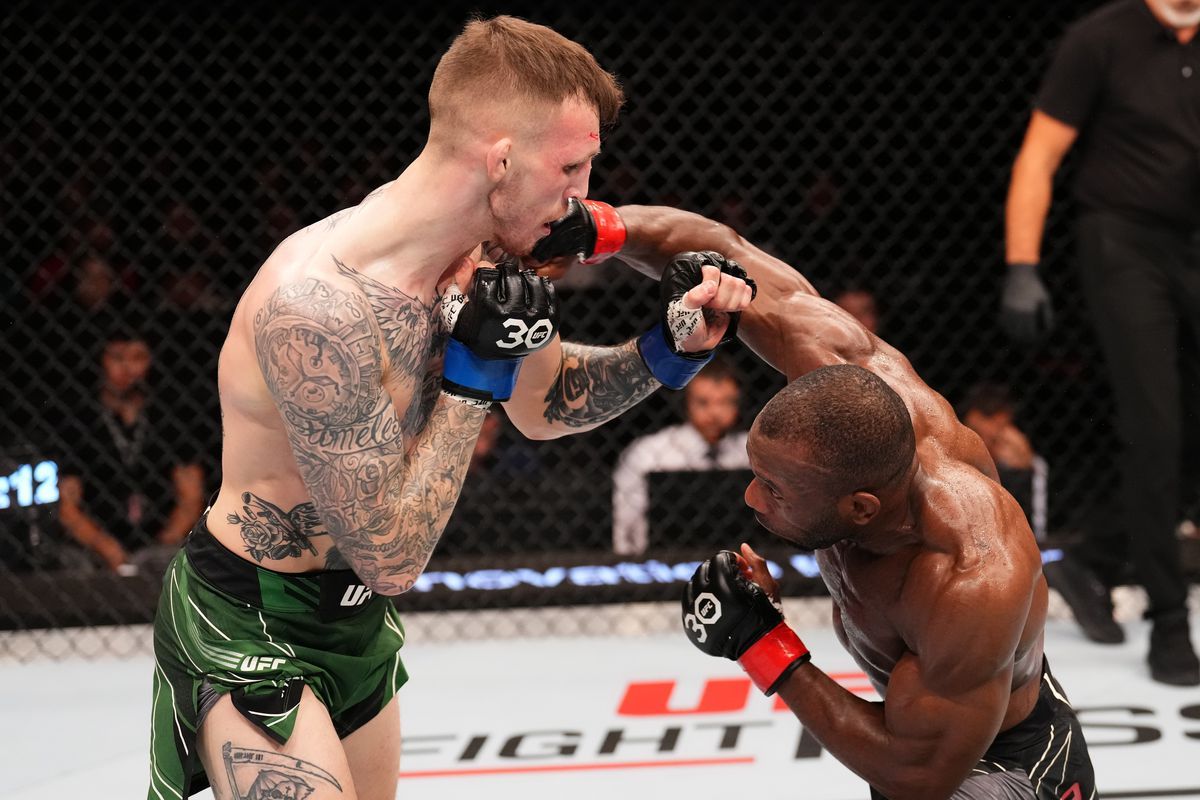 Ange Loosa lands an overhand on Rhys McKee. Credit: MMA Mania.