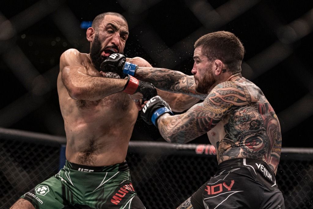 Sean Brady landing a huge straight on Belal Muhammad at UFC 280. Credits to: Craig Kidwell - USA TODAY Sports.