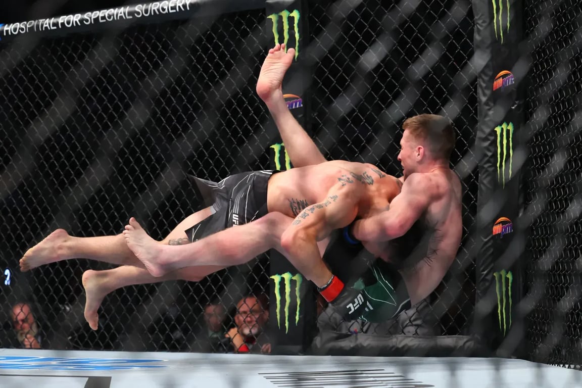 Ricky Simon taking Jack Shore down. Credits to: Ed Mulholland - USA TODAY Sports.