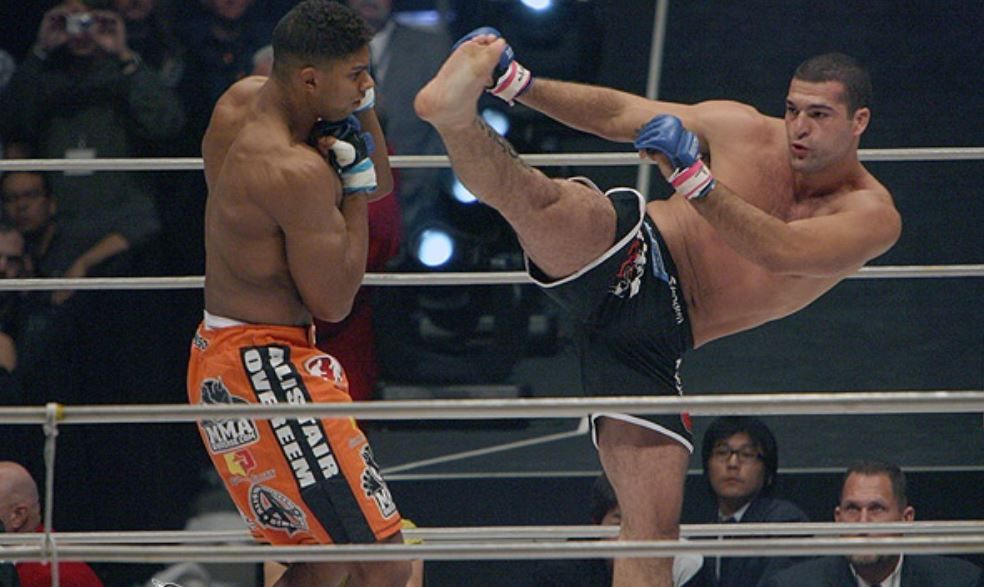 Mauricio Rua missing a kick on Alistair Overeem at PRIDE 33. Credits to Andrew Mahlmann - Bleacher Report.