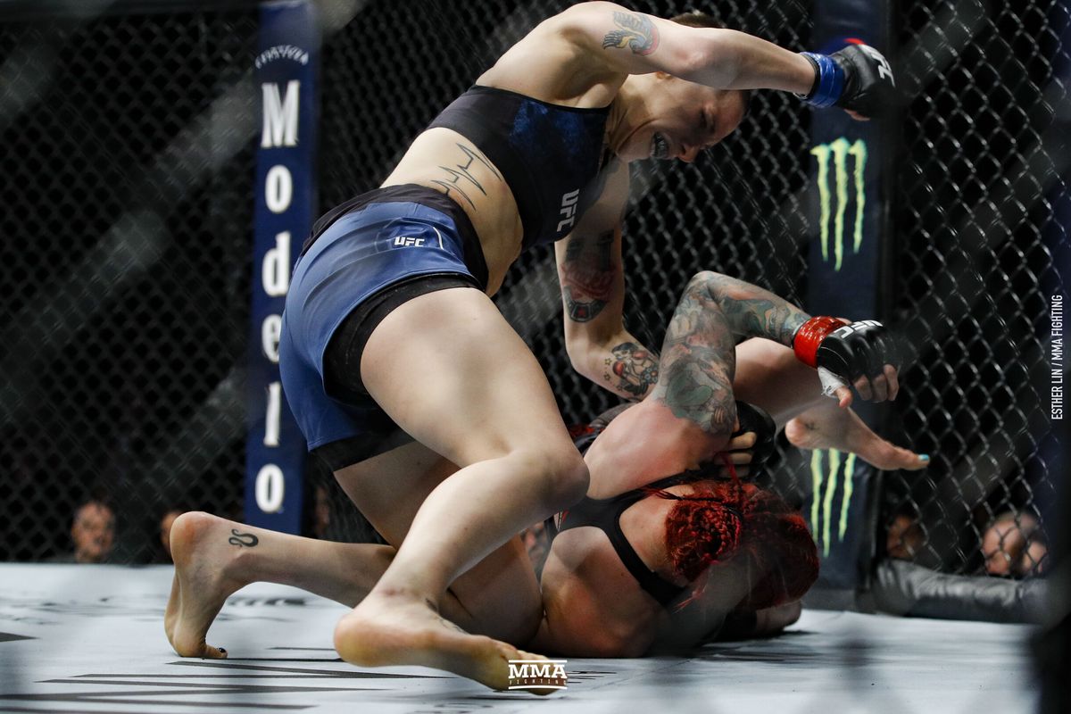Macy Chiasson rains down ground and pound on Gina Mazany. Credit: MMA Fighting.