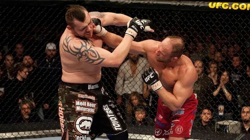 Randy Couture battling with Tim Sylvia. Credits to: Josh Hedges - Zuffa LLC.