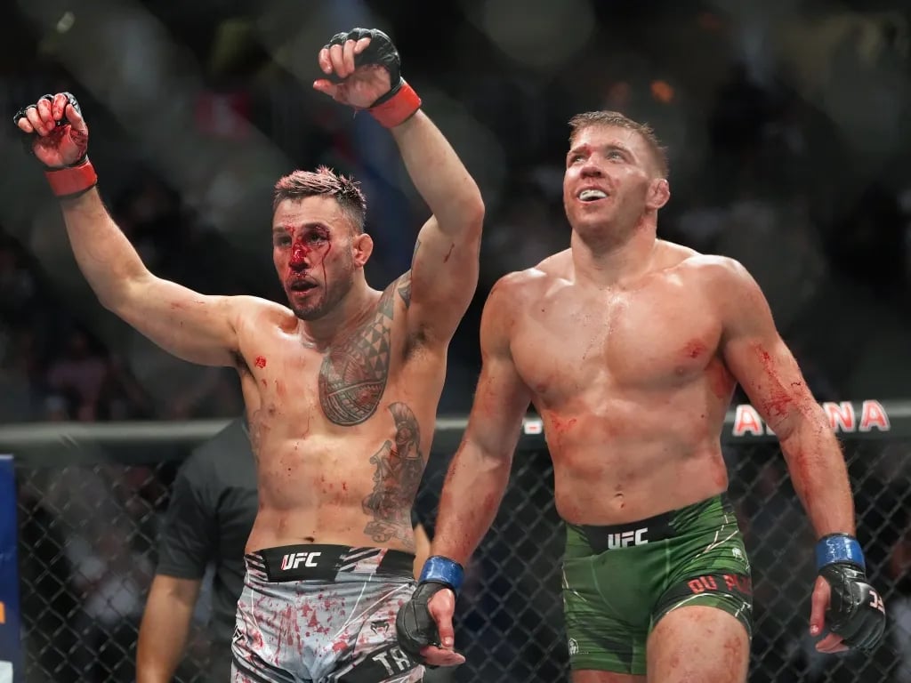 Brad Tavares and Dricus du Plessis after their Fight of The Night at UFC 276. Credits to: Stephen R. Sylvanie - USA TODAY Sports.