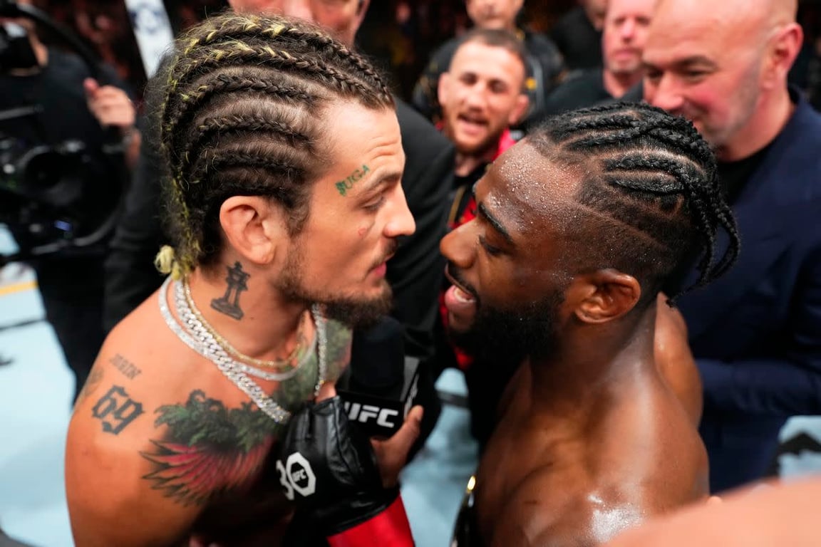 Sean O'Malley and Aljamain Sterling squaring off inside the UFC octagon. Credits to: Chris Unger - Zuffa LLC.