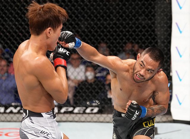Josh Culibao throws a straight at Seung-Woo Choi. Credit to: Sherdog.