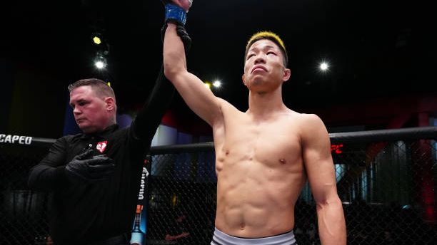 Rinya Nakamura getting his hand raised. Credits to: Jeff Bottari - Zuffa LLC.