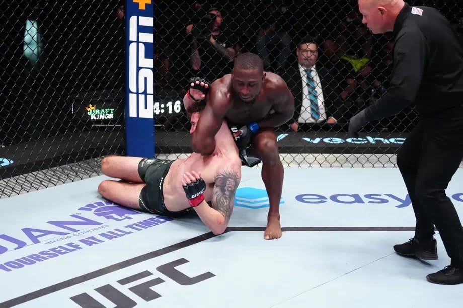 Tresean Gore finishing Josh Fremd with a nasty guillotine choke. Credits to: Jeff Botari - Zuffa LLC.