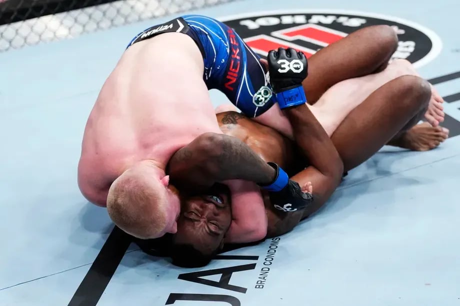 Bo Nickal finishing Jamie Pickett at UFC 285. Credits to: Jeff Botari - Zuffa LLC.
