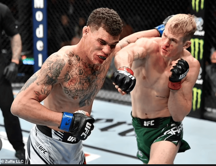 Ian Garry Machado piecing up Jordan Williams. Photo by Zuffa LLC.