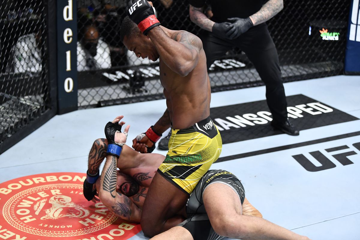 Jailton Almeida lands ground and pound on Danilo Marques. Credit: MMA Fighting.