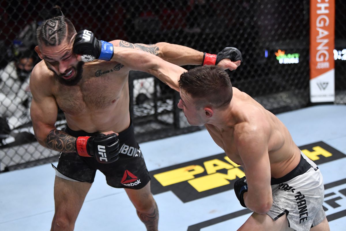 Kai Kara-France lands a right hand on Rogerio Bontorin. Credit: MMA Fighting.