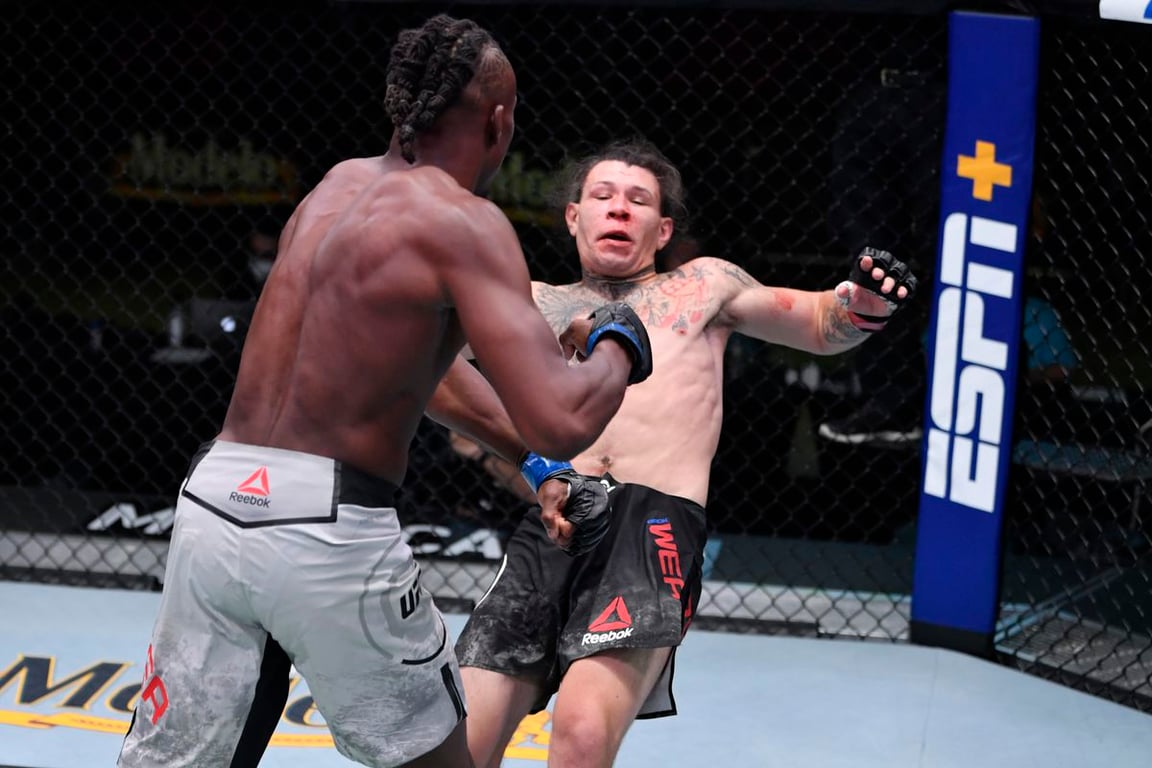 Jalin Turner knocking down Brok Weaver. Credits to: Jeff Botari - Zuffa LLC.