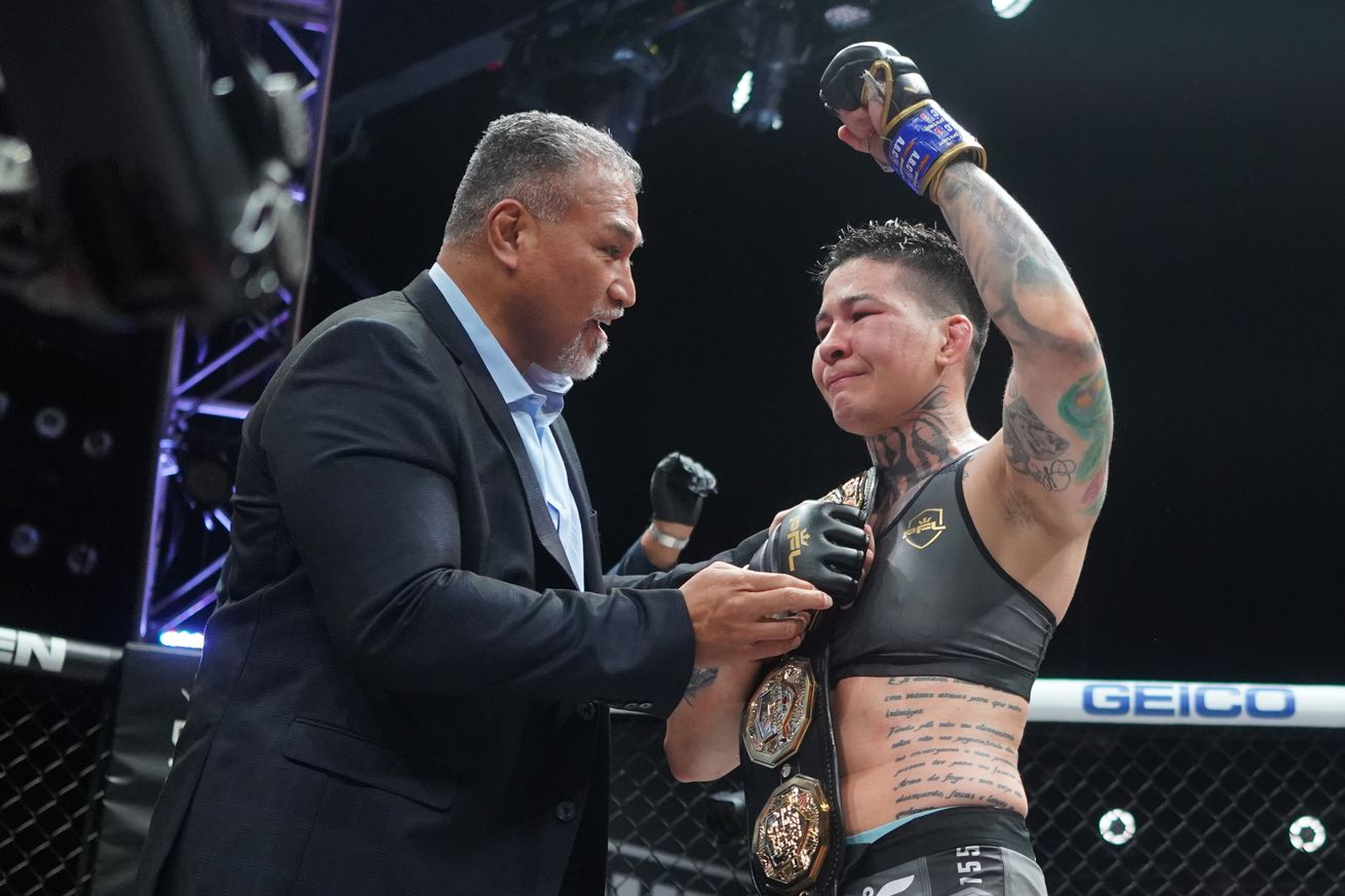 Larissa Pacheco with the PFL belt. Photo by xtremekickboxing.com.