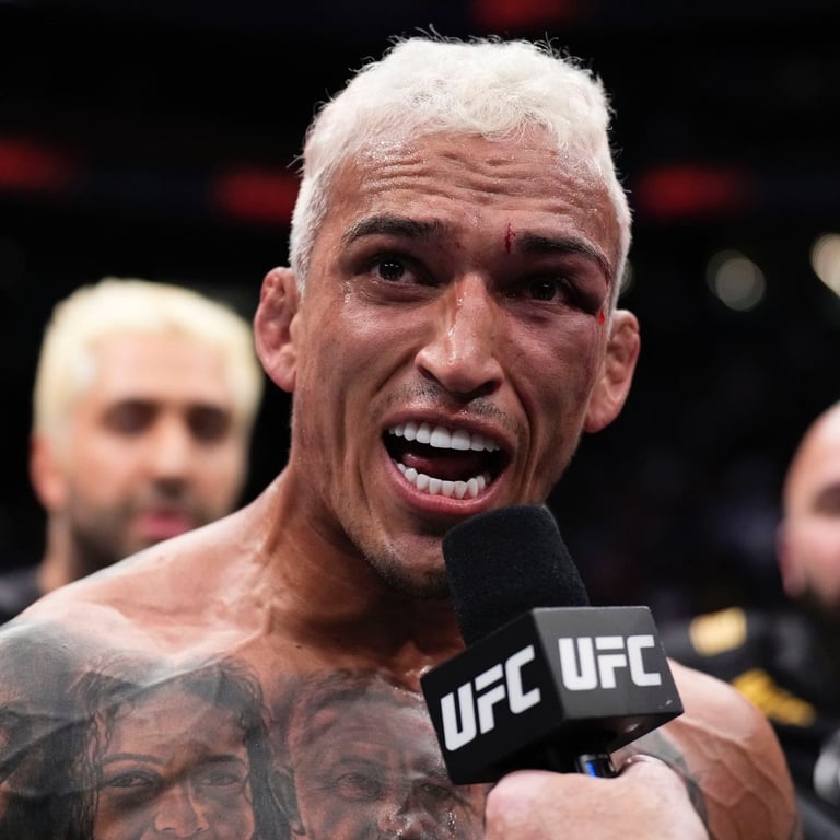Charles Oliveira is the former Lightweight champion. Credits to: Zuffa LLC.